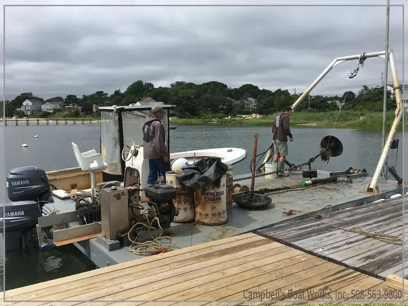 Mooring service barge on the water