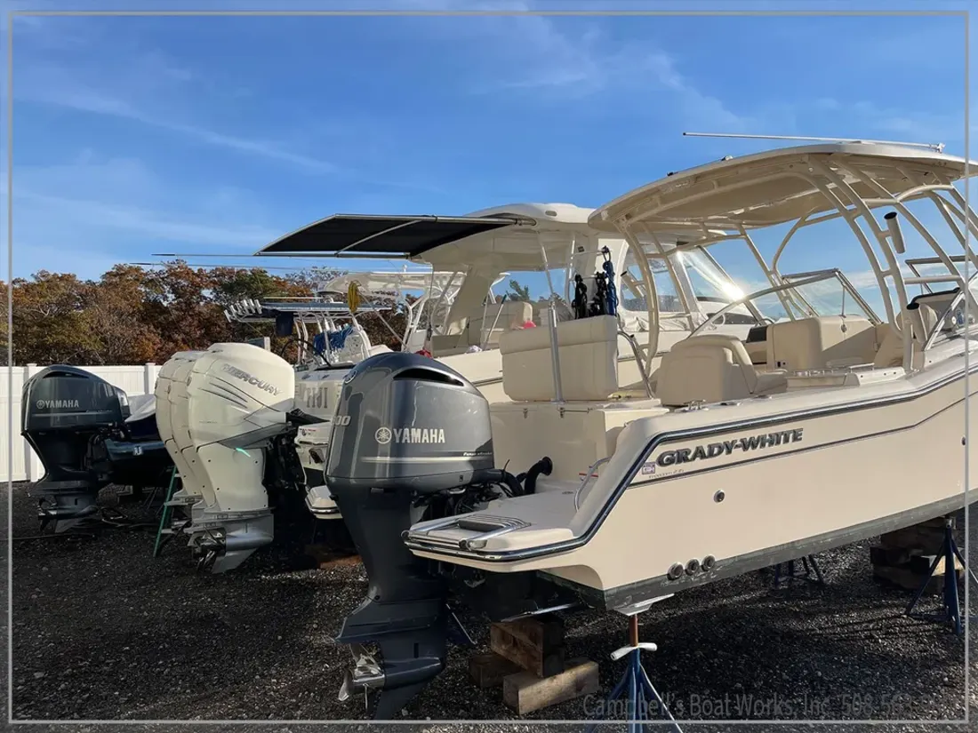 Center console boat with twin outboards in the Campbell's Boat Works yard