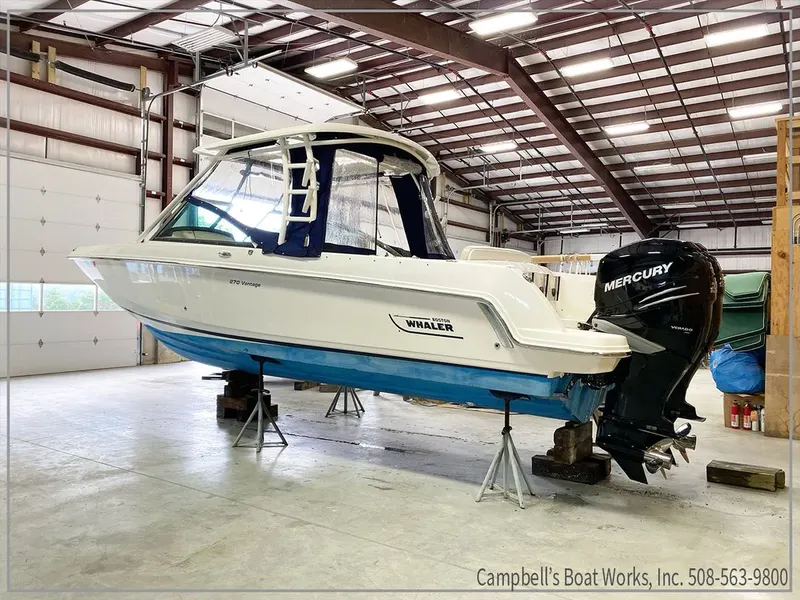 Boat on stands inside the indoor storage building